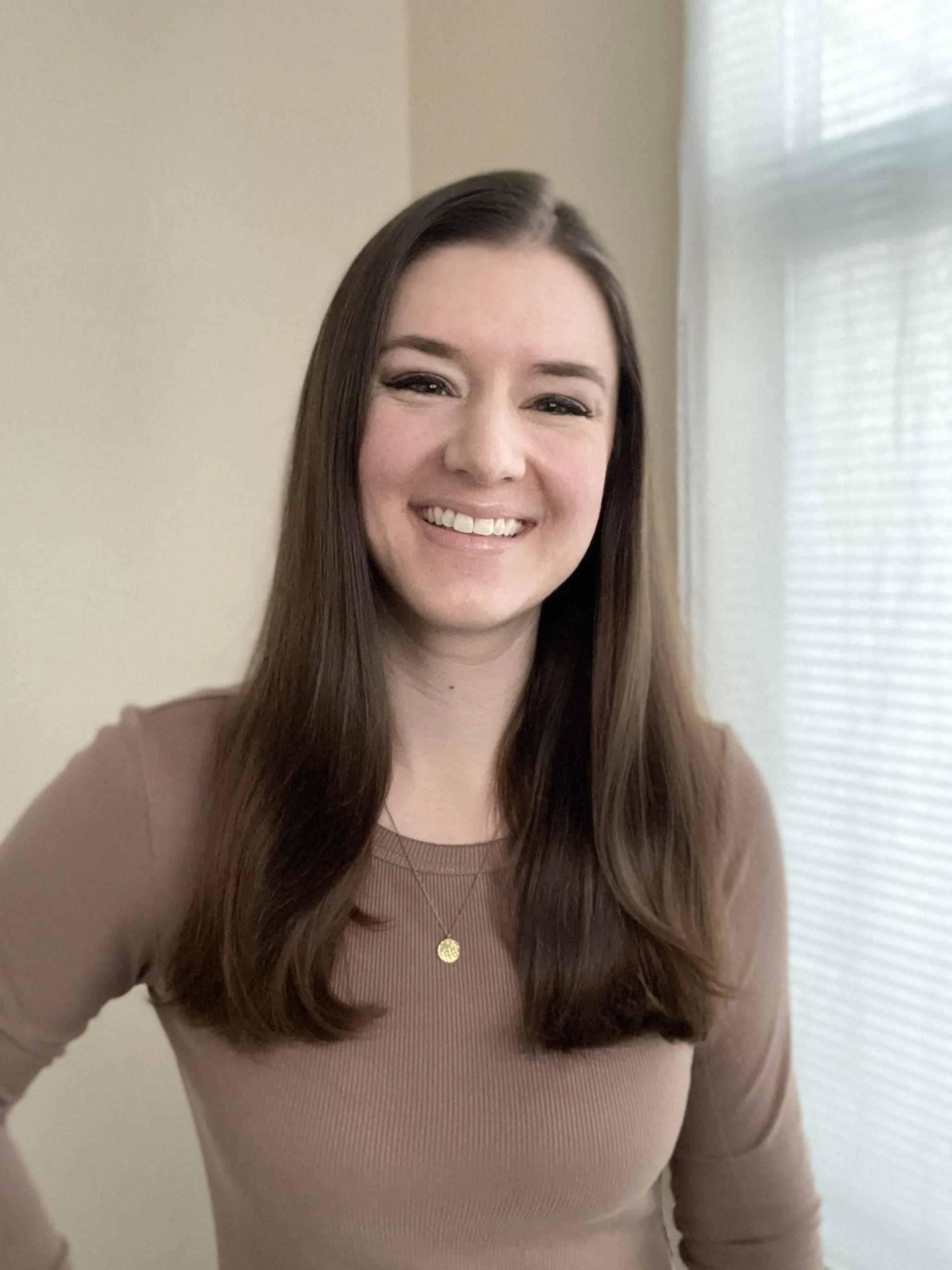 Katie Harp headshot beige shirt